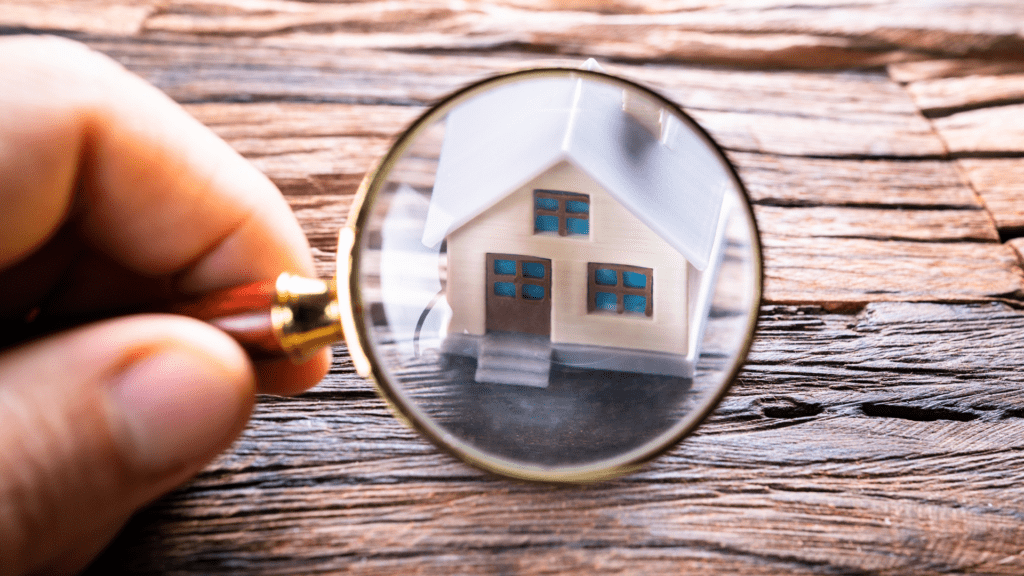 Home inspector examining the roof of a house for first time home buyers